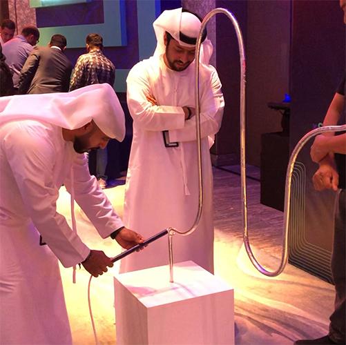 Giant Buzz Wire rental in Dubai with custom branding and wire shape for corporate events, brand activations, and carnival games in the UAE